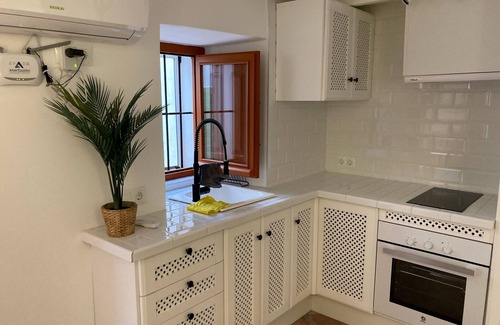 Competa Apartment | "Bodega Millantú" cozy studio. Fully equipped and independent.