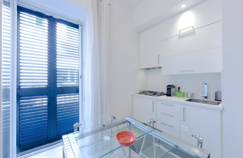 Ischia Porto Apartment | Boutique House Fió in the living room of Ischia