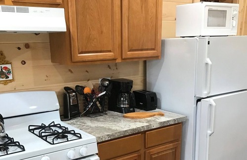 Inlet Cottage | Brand New Beach Front Cottage, located on 4th Lake, walking distance to town.