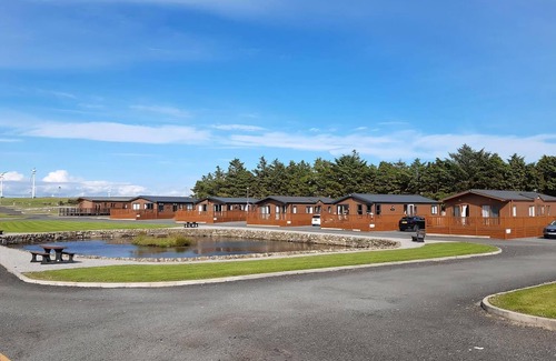 Newton Stewart Ski Chalet | Brand new for 2025. The Aurora lounge is comfortable and flexible.