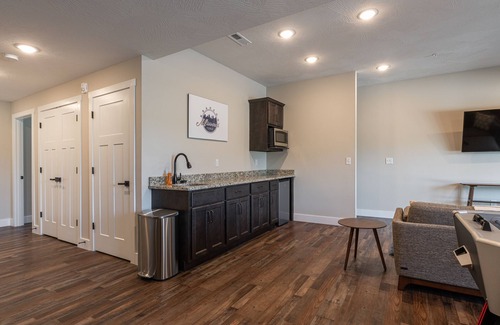 Hollister House | Brand New! Lake View with Hot Tub & Arcade Game Room! Indoor and Outdoor Pool!