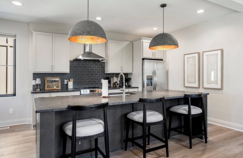 Bowling Green House | Brand-new luxury home in downtown Bowling Green, steps from BGSU. Stylish interiors, gourmet kitchen, and a unique backyard with a custom putting green. Perfect for alumni visits, game days, or weekend getaways.