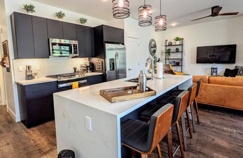 Willow Grove Condo | Brand new property with hot tub, fire pit, parking, covered ski storage, and more!