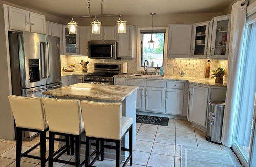 Manitowoc House | Brick Vacation House On Waldo Blvd w/Heated Garage, BBQ, Fire Pit