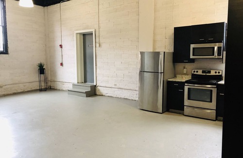 Downtown Houston Apartment | Brick warehouse attic