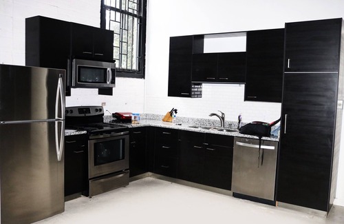 Downtown Houston Apartment | Brick warehouse attic