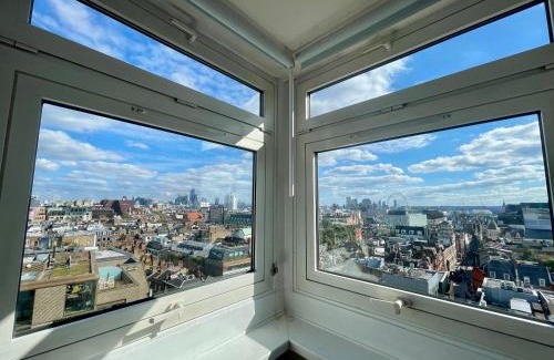 Soho Apartment | Bright 2-Bedroom in Soho High-Rise with Skyline Views