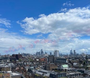 Soho Apartment | Bright 2-Bedroom in Soho High-Rise with Skyline Views