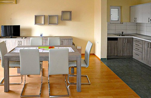 Lopar Apartment | Bright and inviting holiday apartment with inviting communal pool near the beach!