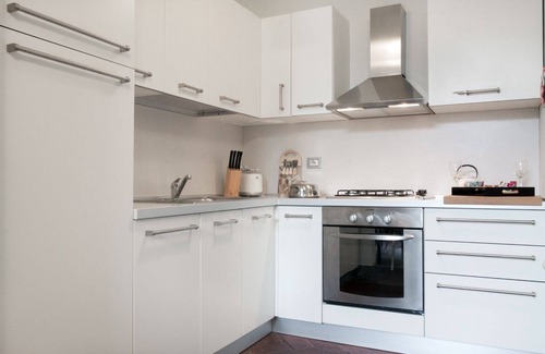 Lucca Historical Center Apartment | Bright apartment in medieval palace between Guinigi tower and the tower hours.