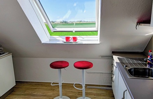 Norddeich Condo | Bright, friendly top floor apartment with WLAN, 15 min. walk to the beach.