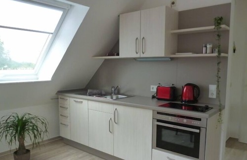 Norddeich Condo | Bright, friendly top floor apartment with WLAN, 15 min. walk to the beach.