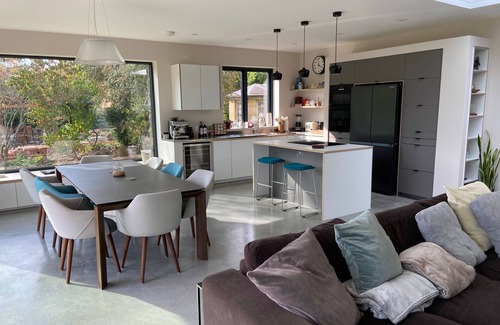 Newdigate House | Bright spacious home with a natural swimming pond in Surrey Hills