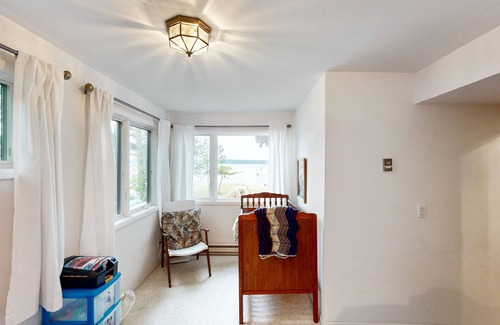 Maple City House | Bright & spacious home on Sandy Tamarack Cove with beach & dock access & firepit