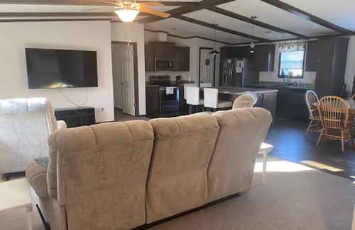 Bradford House | Bring your boat, this home offers a dock to tie up to and 10 feet of lakefront.