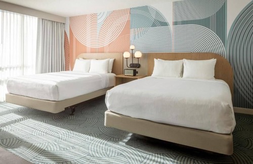 Florida Center Hotel | Bringing the pack? 4 Double Rooms in Orlando near Universal and ICON Park - Pets