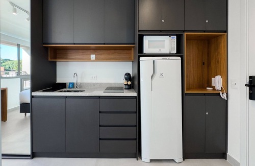 Santo Amaro House | Brooklin Studio: US Consulate & Racetrack