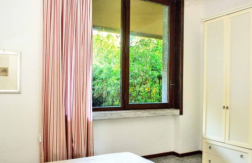 Le Rocchette Apartment | Brown apartment by the sea with private beach and private parking