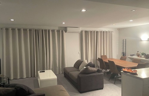 Murrays Bay House | Browns Bay Retreat with Pool Spa Gym and Sauna