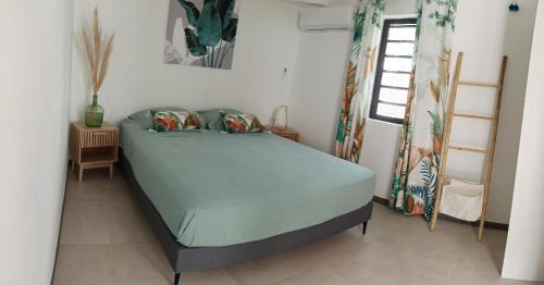 Sainte-Anne Apartment | Bungalow au Coeur du Vert RO 4