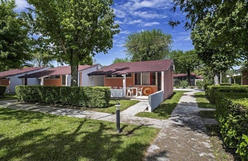 Duna Verde House | Bungalow in Caorle with garden furniture