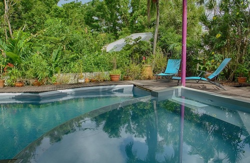 Pointe-Noire Cottage | Bungalow ranked * in a tropical garden with swimming pool, Spa