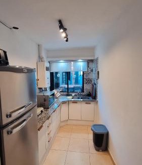 San Juan Apartment | Cómodo departamento con jardín sobre Avenida Libertador