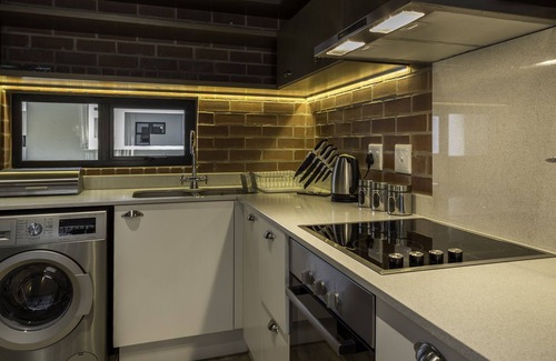 Greater Johannesburg Metropolitan Area Apartment | C.A.G One Bed Apartment in Rosebank Johannesburg