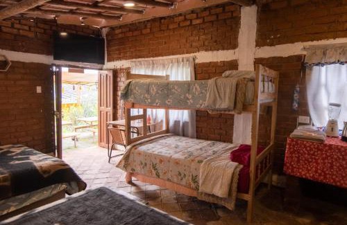 Banos del Inca House | Cabaña Kinti Yuraq en Kinti Wasi Hospedaje