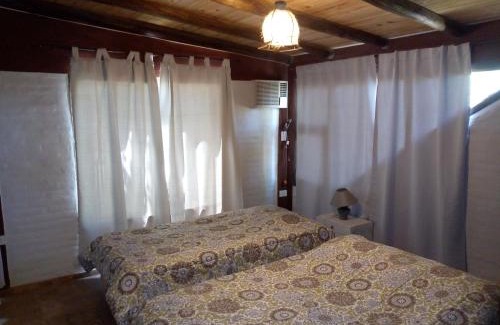 Malargue House | Cabañas CALIGÜE