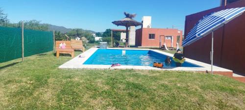 Bialet Masse House | Cabañas Hawaii