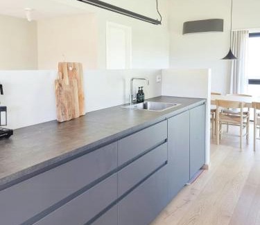 Hjelmeland House | Cabin By The Fjord With Rooftop Terrace On Randøy