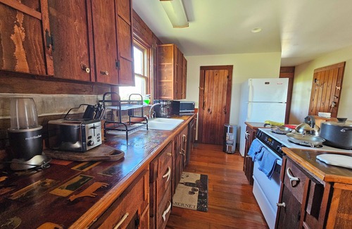Winchester House | Cabin on a farm stay with roaming peecocks