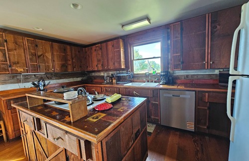 Winchester House | Cabin on a farm stay with roaming peecocks