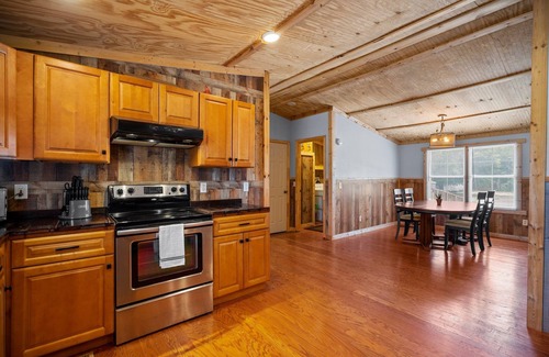 Rocky Point Cabin | Cabin sleeps 10 on 65 acres - dirt bike tracks, 4 wheel, fish, camp, and more!