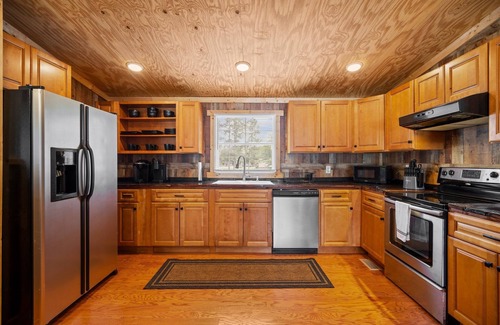 Rocky Point Cabin | Cabin sleeps 10 on 65 acres - dirt bike tracks, 4 wheel, fish, camp, and more!