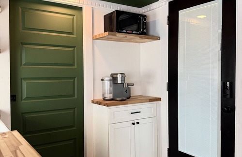 Grimms Landing Cabin | Caboose Tiny Home in Frazier’s Bottom, WV