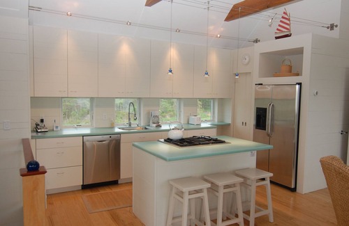 Pocomo House | Cachalot cottage on a bluff directly on Wauwinet Harbor