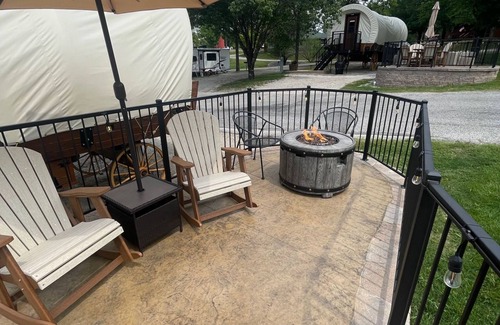 Branson Cottage | California Trail Wagon includes 1 king bed, bathroom w/shower, heat & a/c, smart tv, wi-fi, microwa