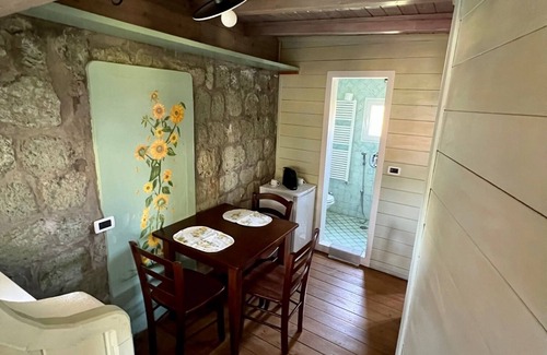 Panza Apartment | "Cambusa Cottage" with terrace, swimming pool and spa hot tub