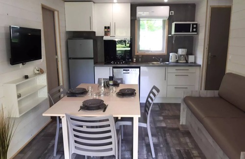 Coulon Ski Chalet | Camping La Venise Verte * - PREMIUM chalet 48 m² (3 bedrooms) including semi-covered terrace + TV + LV + Air conditioning + Plancha 6 people