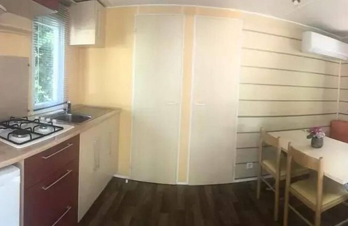 Saint-Jean-Pla-de-Corts Ski Chalet | Campsite Les Casteillets * - Chalet Comfort 16 m2 - 1 bedroom - air conditioning (extra sleeping possibility) 4 persons