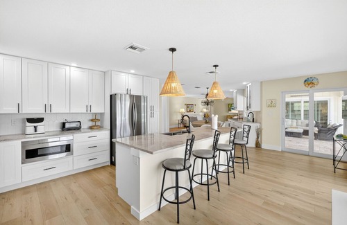 Shell Harbor House | Canal front beauty! NEW