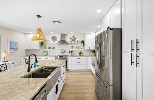 Shell Harbor House | Canal front beauty! NEW