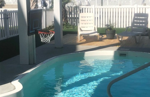 Ocean Isle Beach House | Canal Front w/Putting Green w/private dock & private heated pool; Sleeps 18+