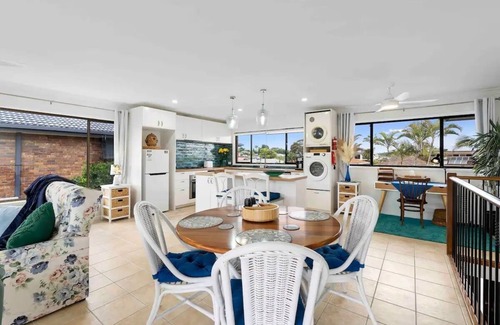 Tweed Heads Apartment | Canal living with private beach, boat ramp, pontoon, fishing and kayaks.