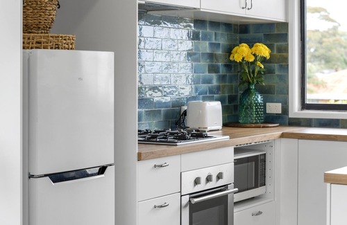 Tweed Heads Apartment | Canal living with private beach, boat ramp, pontoon, fishing and kayaks.