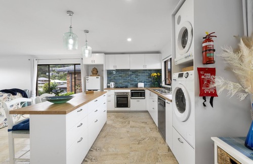 Tweed Heads Apartment | Canal living with private beach, boat ramp, pontoon, fishing and kayaks.