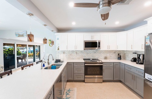 Garden Isles House | Canal Oasis W/Private Dock & Poolside Paradise!