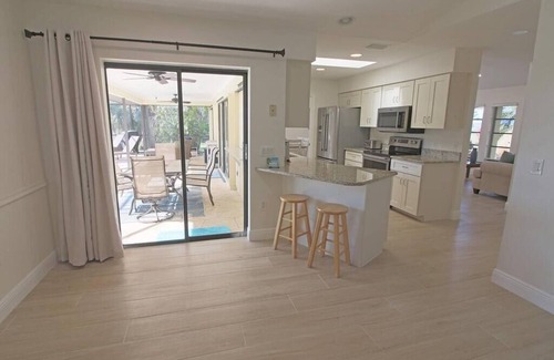 Pebble Beach House | Canal-Side: Pool Home in Rotonda West #61